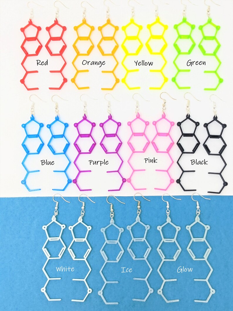May include: A set of 12 pairs of earrings, each pair featuring a geometric design in a different color. The colors include red, orange, yellow, green, blue, purple, pink, black, white, ice, and glow.