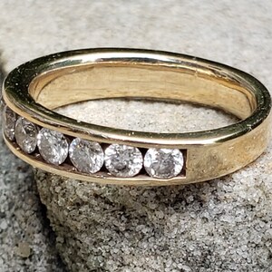 0,94 ct diamantjubileumsring / kanalfattad diamantjubileumsring / diamantvigselring bild 3