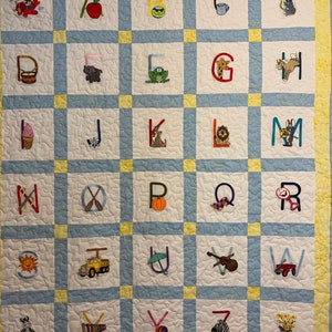 Alphabet embroidered child quilt