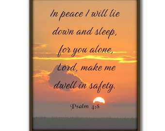 May include: A framed print with a sunset background and the text "In peace I will lie down and sleep, for you alone, Lord, make me dwell in safety. Psalm 4:8".