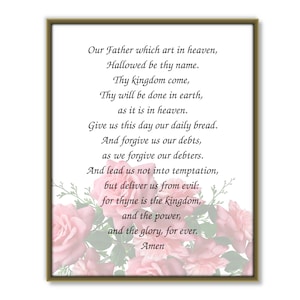 May include: A framed print with a white background and pink roses. The print features the Lord's Prayer in black text.
