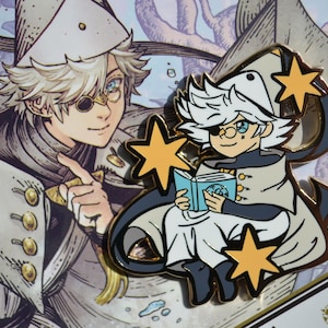 May include: Enamel pin featuring a cartoon wizard with white hair, glasses, and a blue book. The wizard is wearing a white robe and hat, with gold star accents. A second illustration of the wizard is in the background.