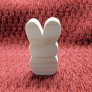 wood bunnies, 4 1/2" tall, 2 1/4" wide, 3/4" thick