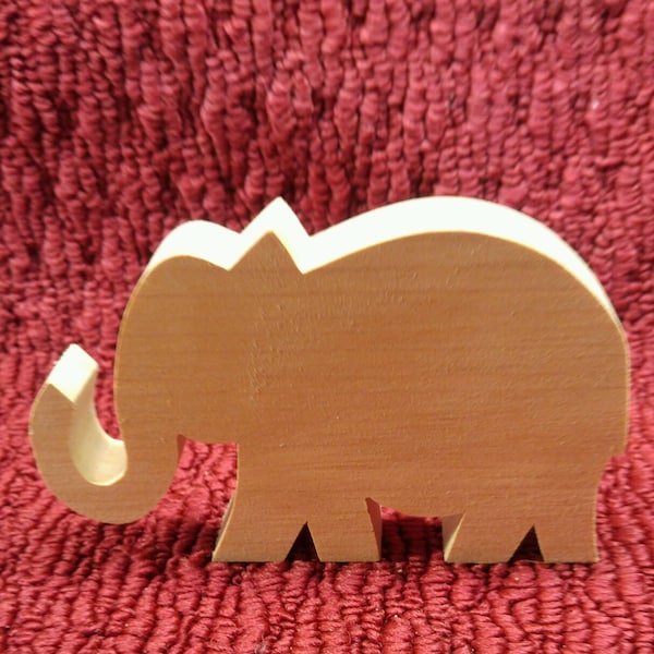 wood elephant 3 1/4" tall, 5" wide, 3/4" thick