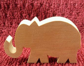 wood elephant 3 1/4" tall, 5" wide, 3/4" thick
