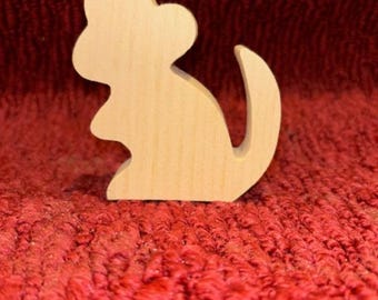 May include: A wooden cutout of a mouse in a standing position with its tail curled behind it. The mouse is light brown and unpainted.