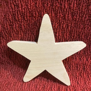 wood  7" star,  7" tall, 7" wide, 3/4" thick