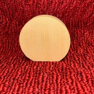 wood round plaque, with flat bottom.  3&quot; tall, 3&quot; wide, 3/4&quot; thick