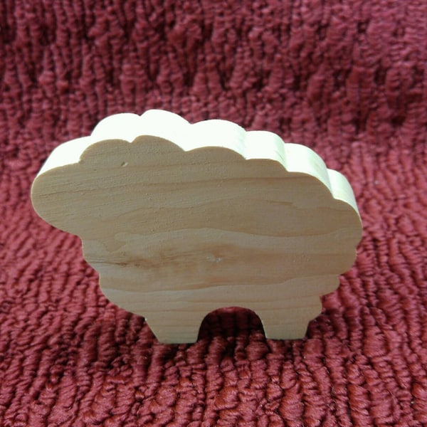 wood sheep 3" tall and 3 3/4" wide, 3/4" thick