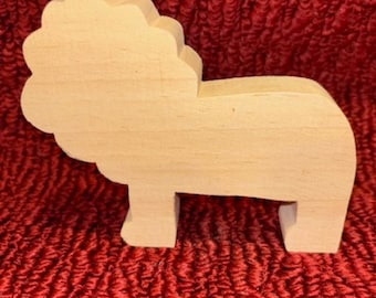 wood lion 3 3/4" tall, 4 1/2" wide, 3/4" thick