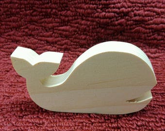 wood whale 2 1/2" tall and 4  3/4" wide, 3/4" thick