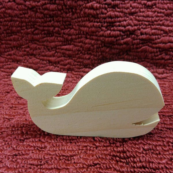 wood whale 2 1/2" tall and 4  3/4" wide, 3/4" thick