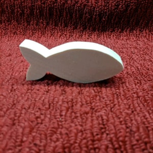 wood fish 4 1/2" wide, two inches tall