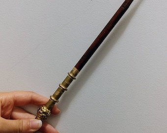Wooden wand with gold handle