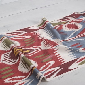 Antiguo patrón de tela de telar Ikat Material interior colorido Tela Ikat Tela de diseñador Telar manual Textura de tela Ikat Tapicería de tela Ikat