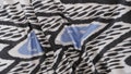 Handwoven Black and Blue Silk Ikat Fabric, Organic Cotton Blend product logo