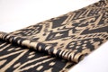 One sided ikat design fabric, black and golden sateen ikat fabric, handwoven fabric, silk ikat fabric, throw ikat fabric, uzbek ikat fabric product logo