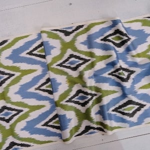 Olive green and blue ikat fabric, blue ikat fabric uk delivery, ikat fabric upholstery, ikat dress fabric, ikat fabric, classic hues fabric