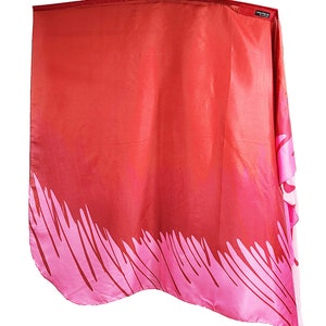 May include: A red and pink silk dance scarf with a pink leaf design at the bottom edge. The scarf is made of a soft, flowing fabric and is perfect for dance performances or as a decorative accent.