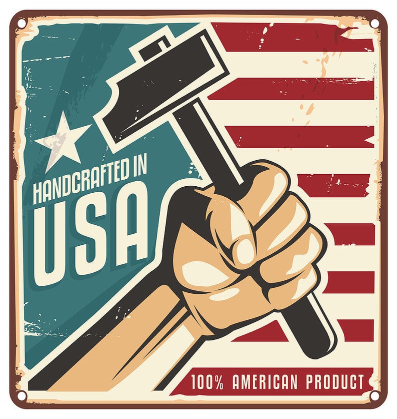 May include: A vintage-style metal sign with a distressed look. It features a hand holding a hammer against a red, white, and blue American flag background. The text on the sign reads "Handcrafted in USA 100% American Product".