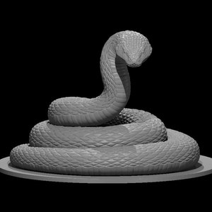 May include: A gray, coiled snake sculpture with a raised head and a textured surface. The snake is on a round, gray base.