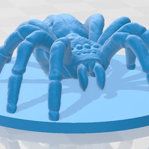 May include: A blue 3D printed model of a spider with eight legs and a textured body.
