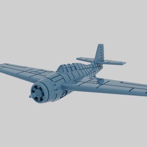 May include: A blue model airplane with a propeller and a detailed design. The airplane is made of plastic and has a realistic look.