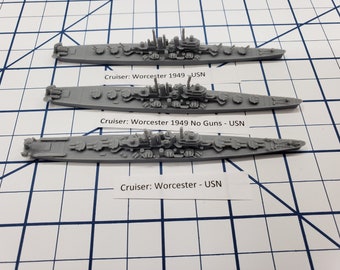May include: Three gray 3D printed model ships of the USS Worcester cruiser. The top ship is labeled "Cruiser: Worcester 1949 USN". The middle ship is labeled "Cruiser: Worcester 1949 No Guns - USN". The bottom ship is labeled "Cruiser: Worcester - USN".
