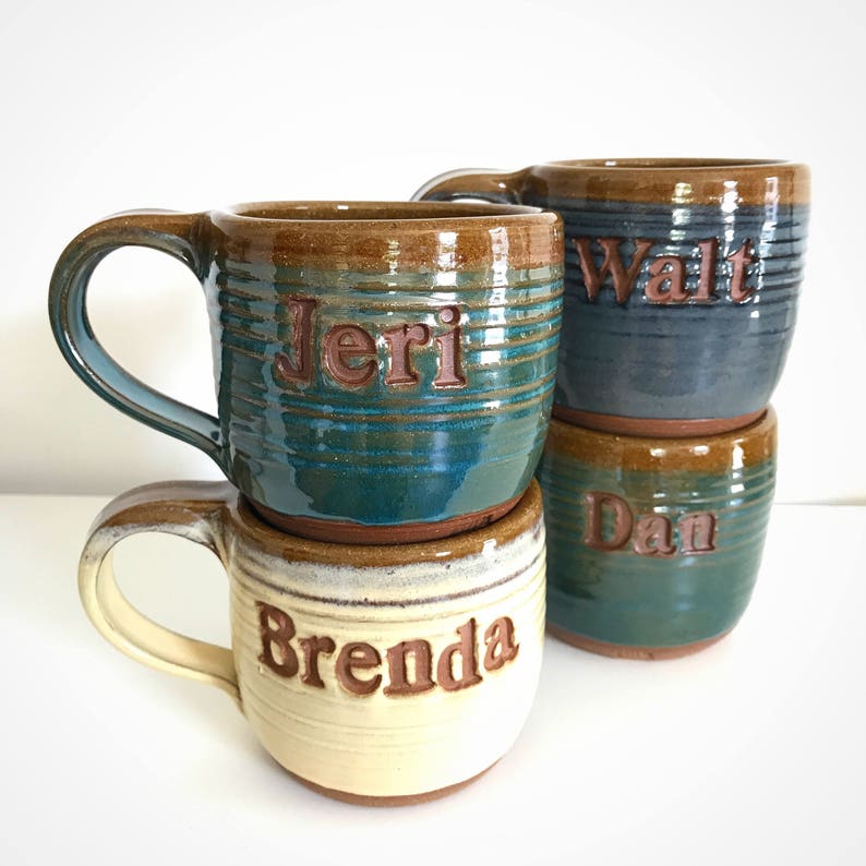 Multicolored mugs.  Jeri in ocean (primary) and mocha, Brenda in Ella (primary) and mocha, Walt in Shadow (primary) and mocha, Dan in ocean (primary) and mocha