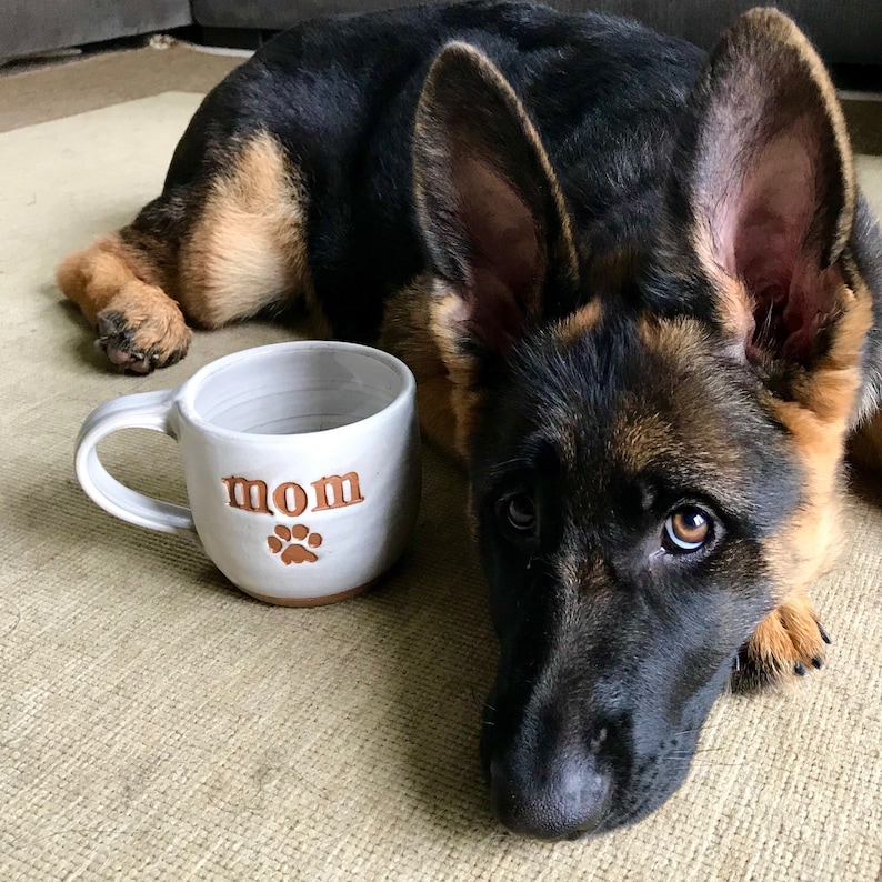 Mom mug with paw print underneath in solid alabaster glaze.  Paw print can also be stamped on opposite side instead.