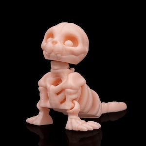 Skeleton Seal Figurine – Cute & Creepy Undead Sea Animal for Spooky Decor
