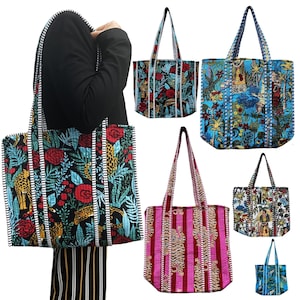 May include: A collection of tote bags with various colorful patterns. One bag features a black background with red roses, green leaves, and leopard print. Other bags have floral and animal prints in blue, pink, and white.