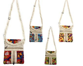 May include: Four crossbody bags with adjustable straps. The bags have a natural-colored woven body with colorful embroidered panels. The panels feature floral and geometric designs in red, blue, yellow, and green.