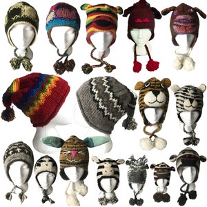 May include: Assortment of colorful knitted hats with animal faces and pom-poms. The hats are made of wool and have a variety of designs, including stripes, zigzags, and animal faces.