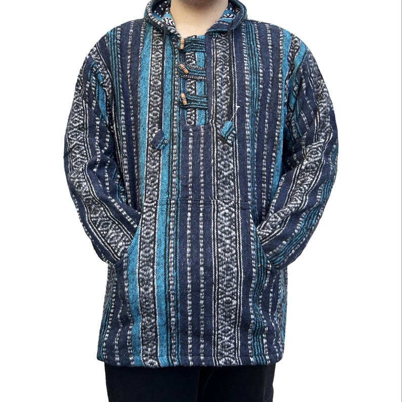 May include: A blue and white striped hooded pullover with a drawstring closure. The pullover has a relaxed fit and is made of a soft, comfortable fabric.