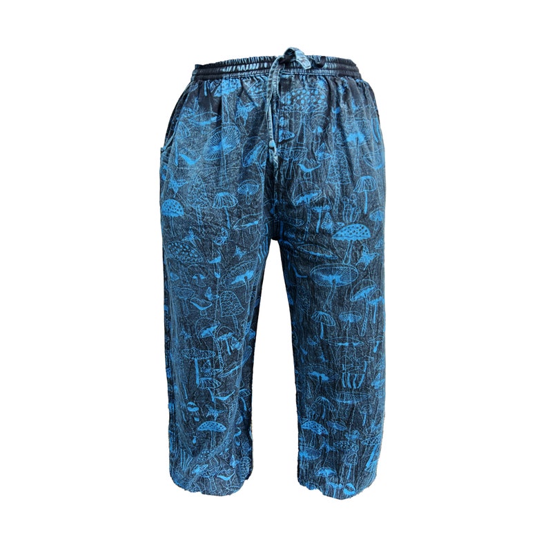 May include: Blue and black trousers with a mushroom print.