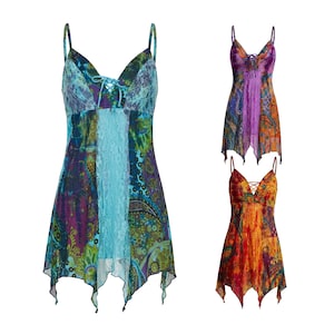 May include: Three paisley print camisole tops with spaghetti straps. Each top has a lace-up neckline and a central lace panel. The colour scheme includes blue, purple, green, orange, and red.