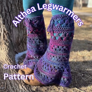 May include: Purple and blue crochet leg warmers with a fringe detail. The leg warmers are made with a textured stitch and have a flared shape. The text "Althea Legwarmers Crochet Pattern" is written in purple on a white background.