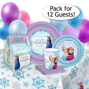 May include: A party supply set featuring Frozen-themed paper plates, a paper cup, a favour box, and napkins, all decorated with snowflake patterns and images of Elsa and Anna. The set includes balloons and a sign that reads Pack for 12 Guests!
