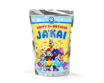 May include: A silver pouch with a yellow label that says "Happy 3rd Birthday Ja'Kai". The label also features a cartoon dog character and the words "Doggyland" and "Bow Wow Wow".