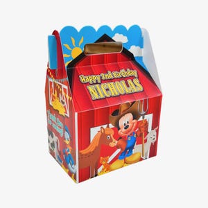 May include: A red barn-shaped party favor box with a handle, featuring Mickey Mouse in a cowboy hat. The box reads "Happy 2nd Birthday NICHOLAS" and includes images of a horse, cat, and goat.