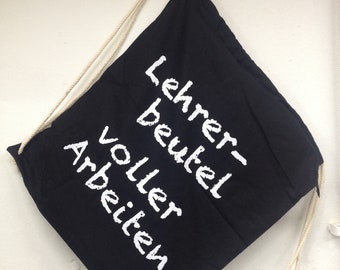 Turnbeutel mit Spruch "Lehrerbeutel voller Arbeiten", Schwarz mit Aufdruck im Siebdruck, vegane Farbe, Baumwolle, Kordelzug, Lehrertasche