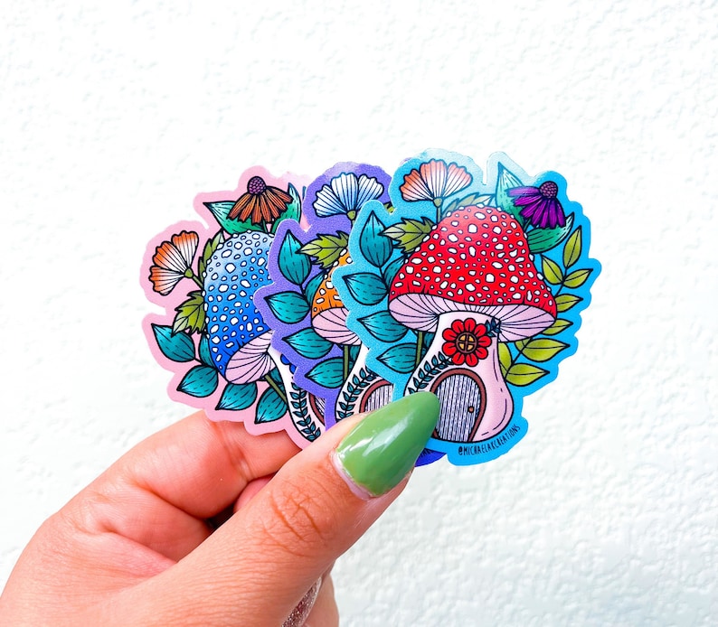 Puede incluir: Cuatro pegatinas de setas coloridas con un dise&ntilde;o caprichoso. Cada pegatina presenta una seta con una casa en su interior y una variedad de flores y hojas. Las pegatinas son perfectas para a&ntilde;adir un toque de fantas&iacute;a a cualquier proyecto.