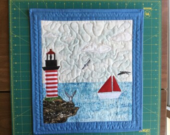 West Quoddy Light with boat landscape fiber art quilted wall hanging