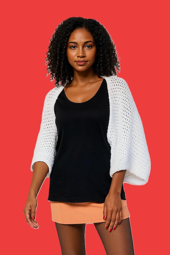 Hand-crocheted bolero in white made from chenille yarn