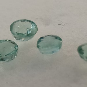 0.295 carat Emerald Set. Natural.