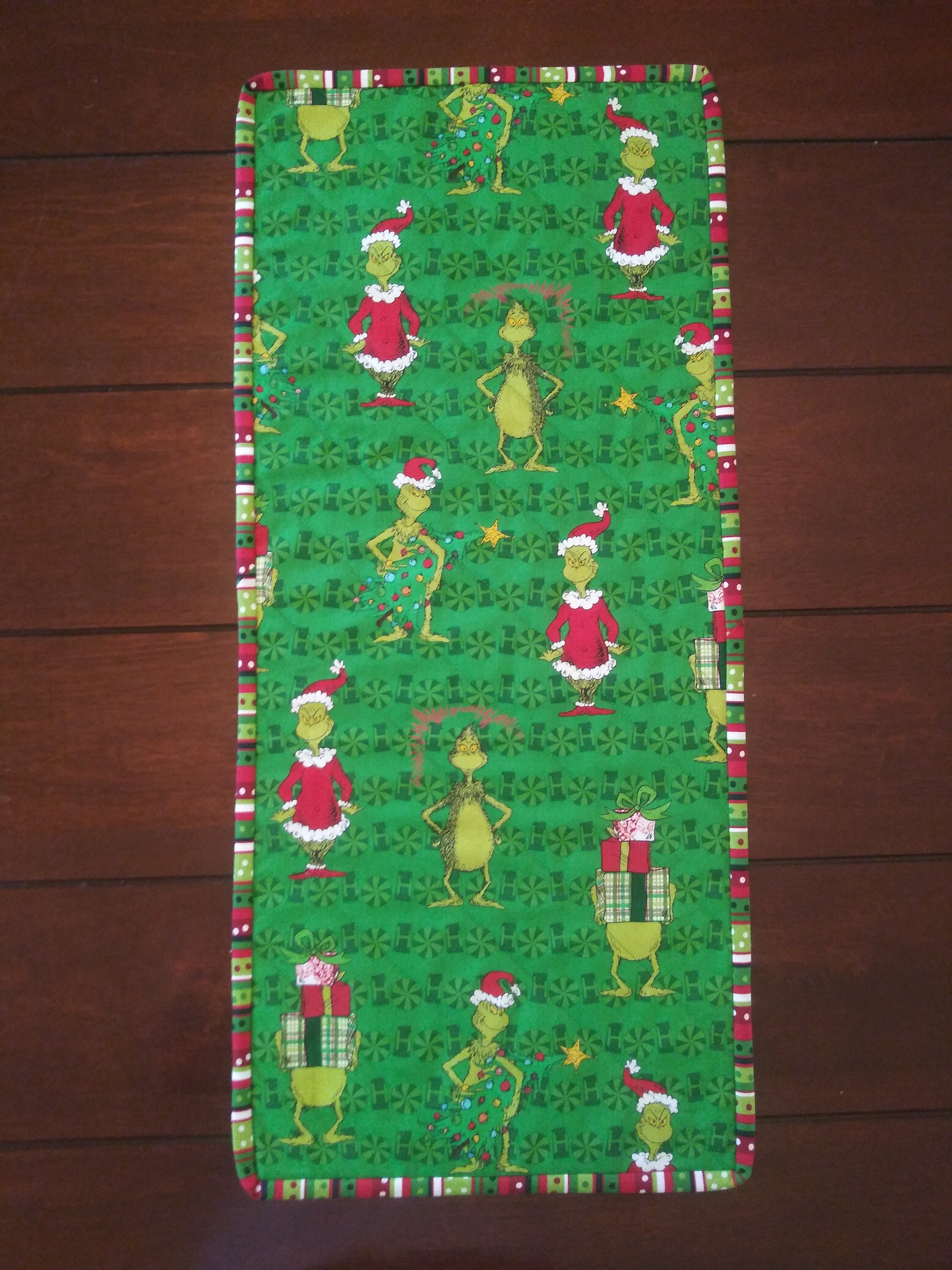 Grinch celebrates Christmas table runner Etsy