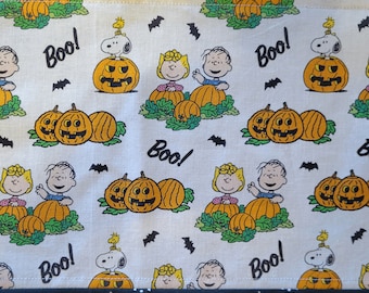 Puppy is waiting for the Great Pumpkin to arrive table runner