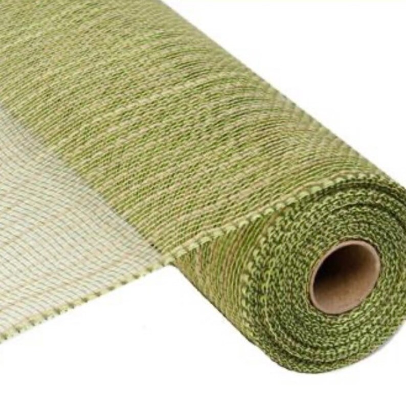 May include: A roll of green and white deco mesh, a type of craft material used for decorating.