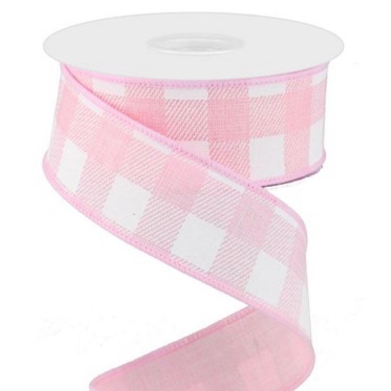 May include: Pink and white gingham ribbon with a wired edge. The ribbon is 2.5 inches wide and is perfect for crafting and decorating.
